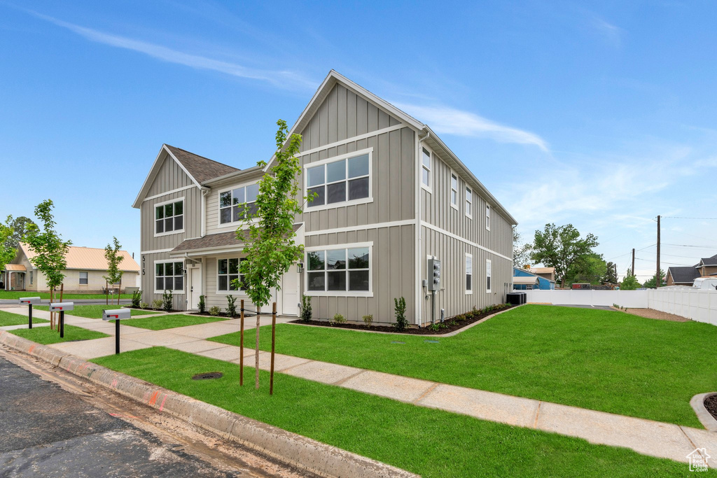 View of front of home with board and batten siding