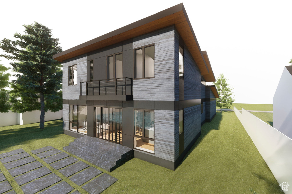 Back of house with a balcony