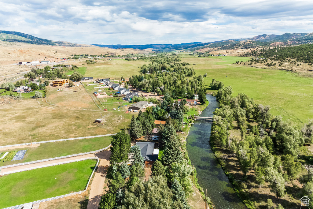 Overview of rural landscape with a mountain backdrop