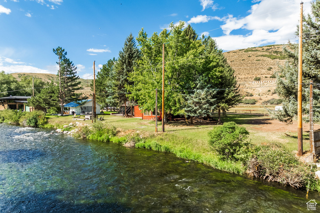 View of yard featuring a water view