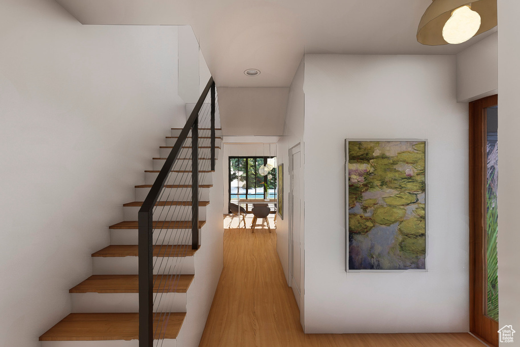 Stairway with wood finished floors