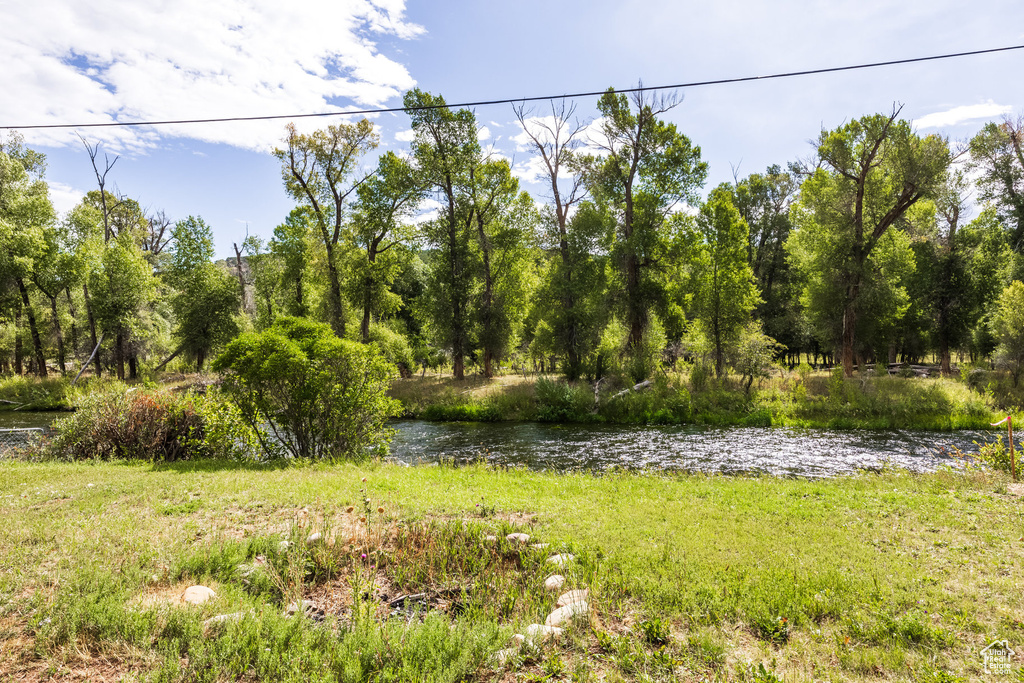 View of yard featuring a water view