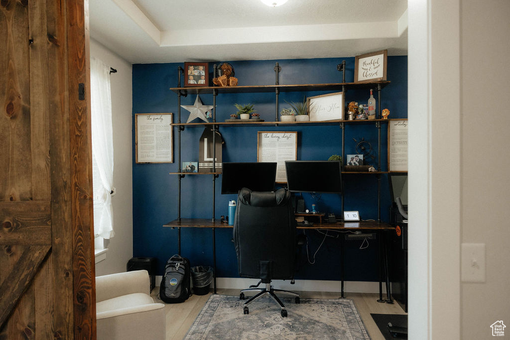 Office area featuring wood finished floors