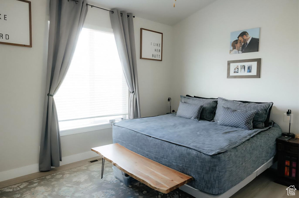 Bedroom featuring baseboards