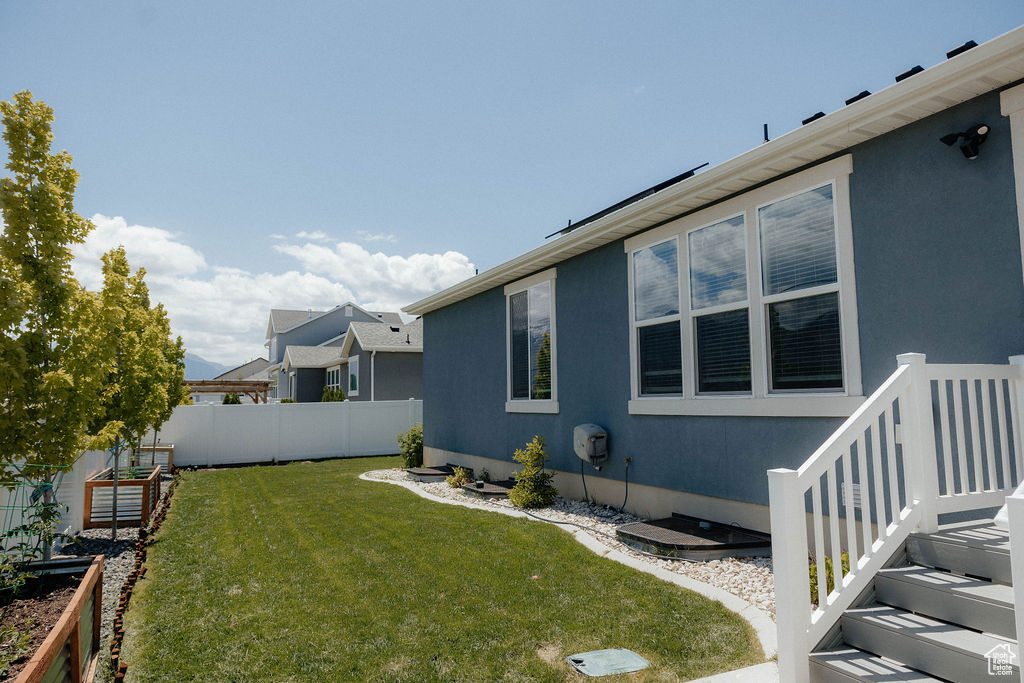 View of yard featuring a vegetable garden