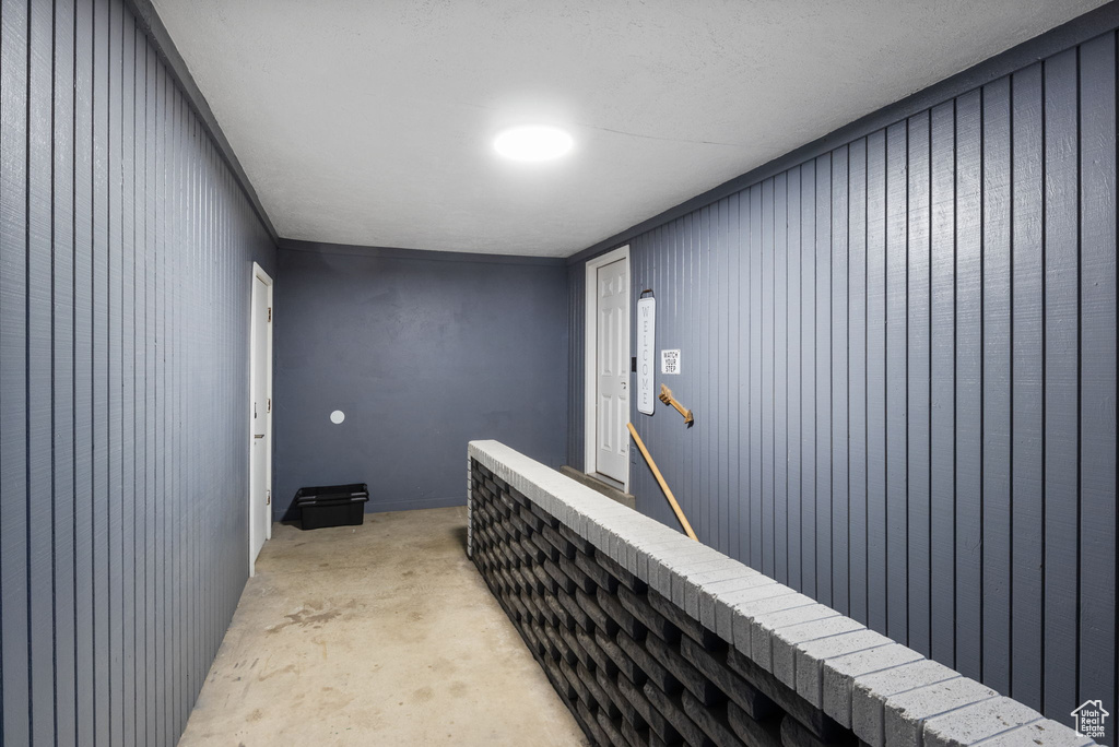Hall featuring an upstairs landing