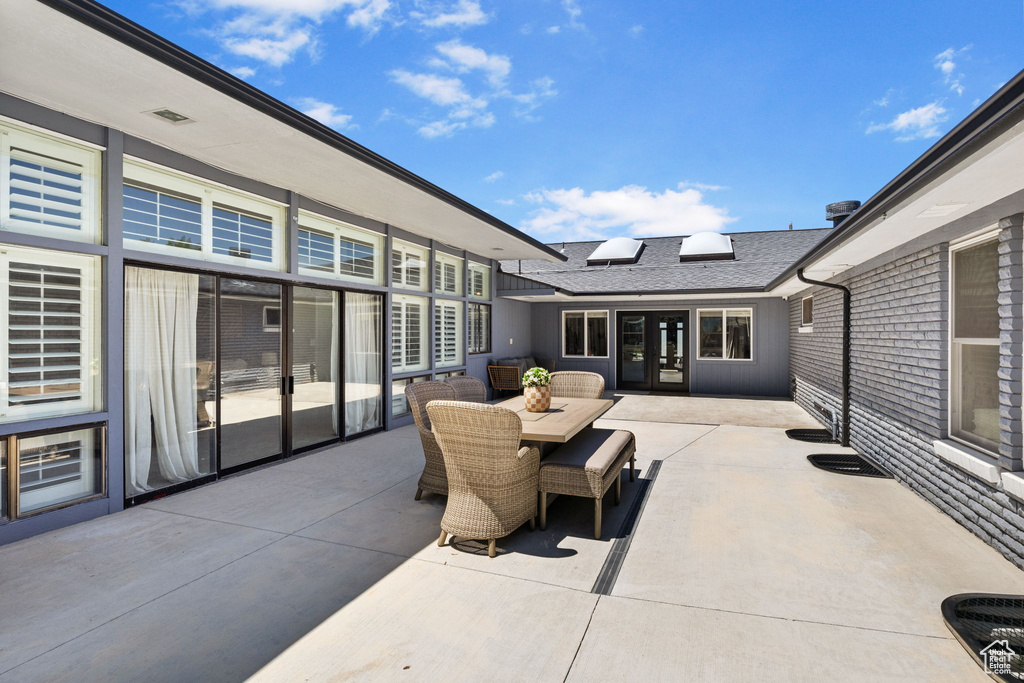 View of patio / terrace featuring french doors and outdoor dining area