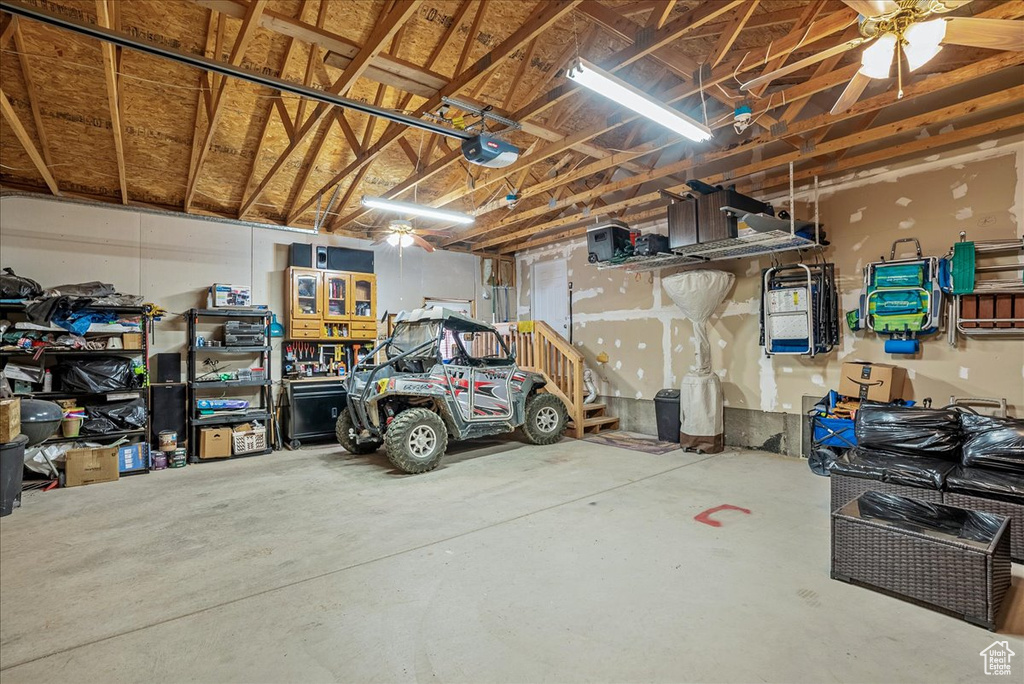 Garage featuring a garage door opener