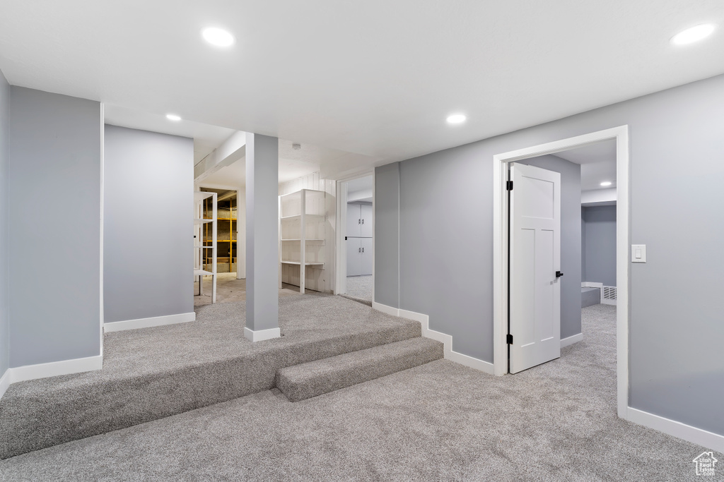 Below grade area with carpet flooring, recessed lighting, and baseboards