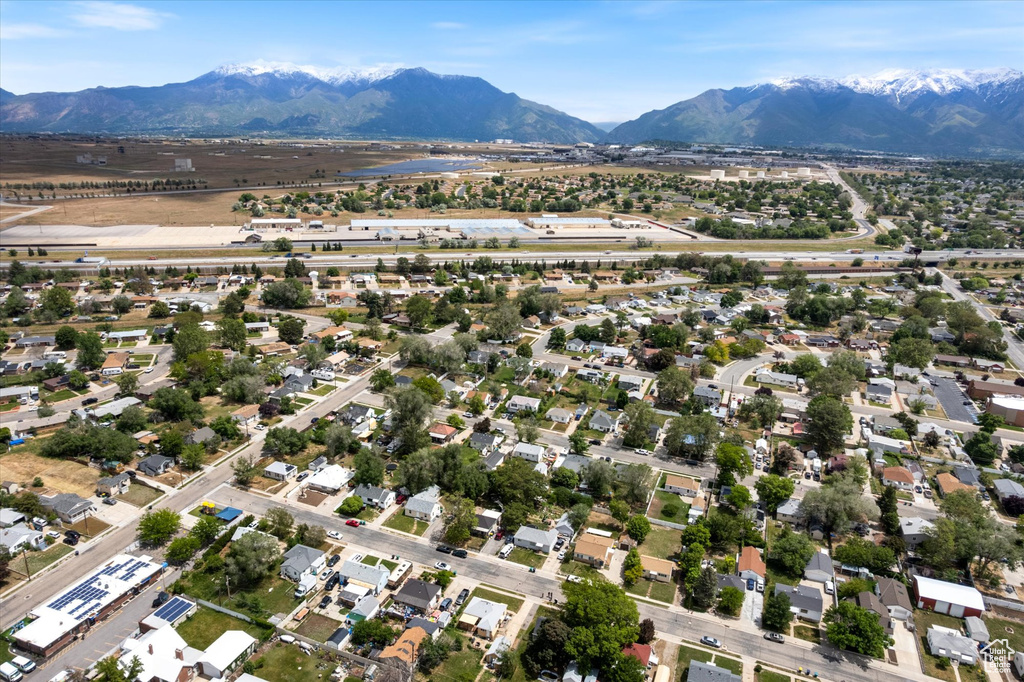 Aerial view of residential area with a mountainous background