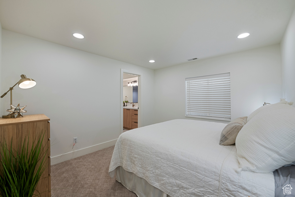 Bedroom featuring carpet, recessed lighting, and baseboards