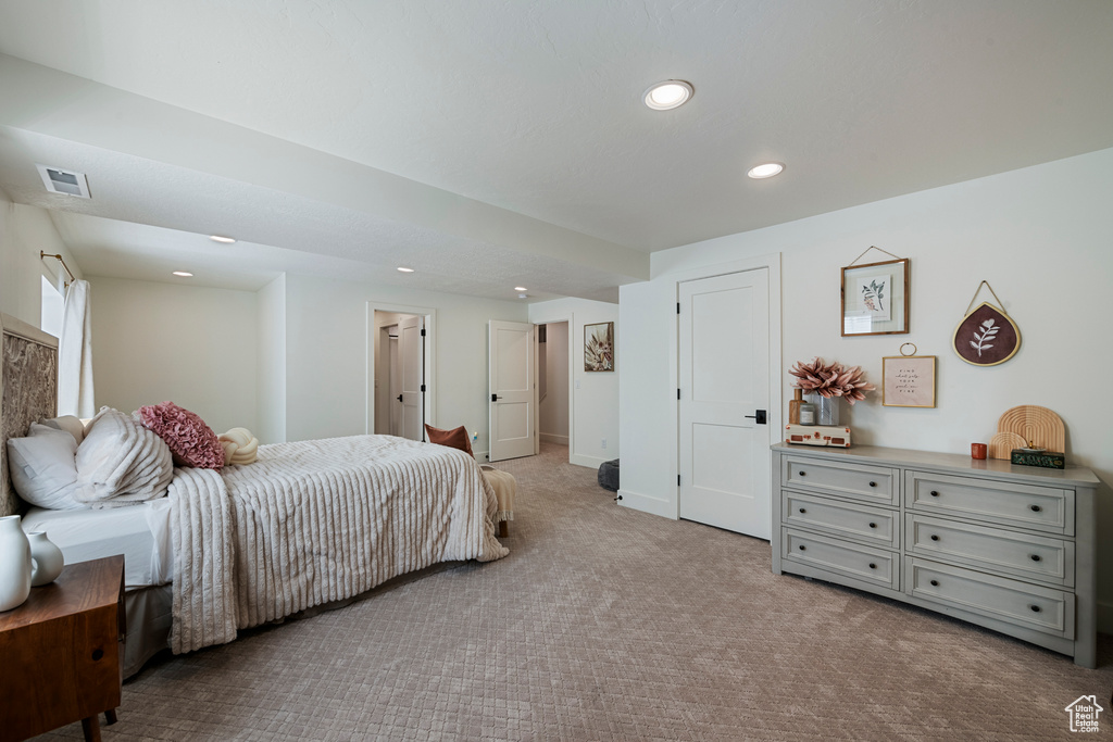 Bedroom featuring carpet and recessed lighting