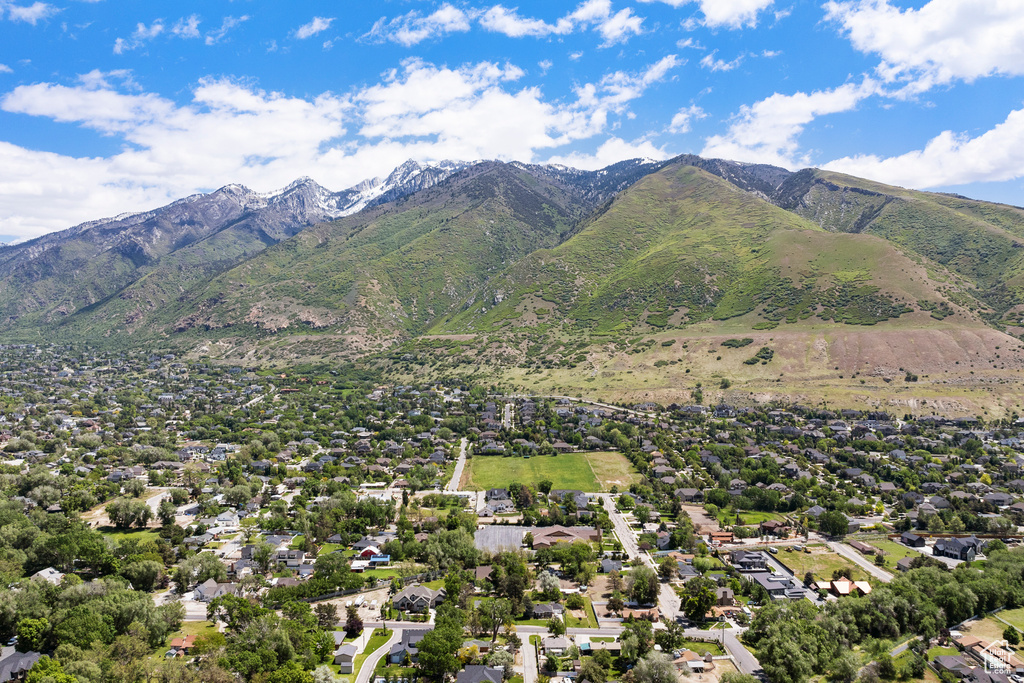 Aerial view of residential area with a mountain backdrop