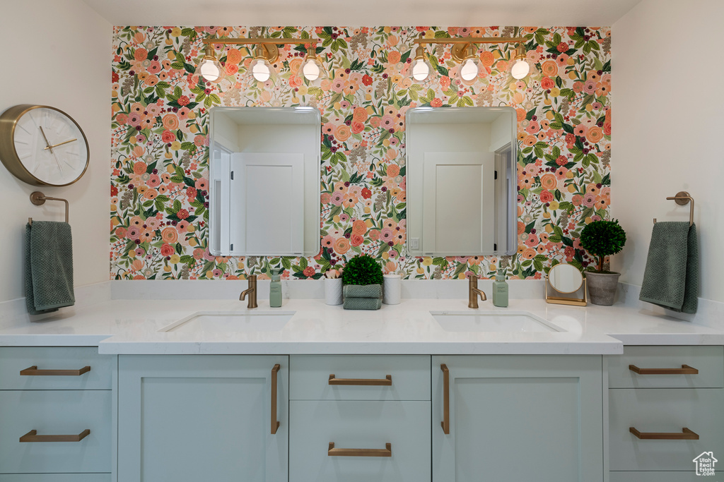 Bathroom featuring double vanity