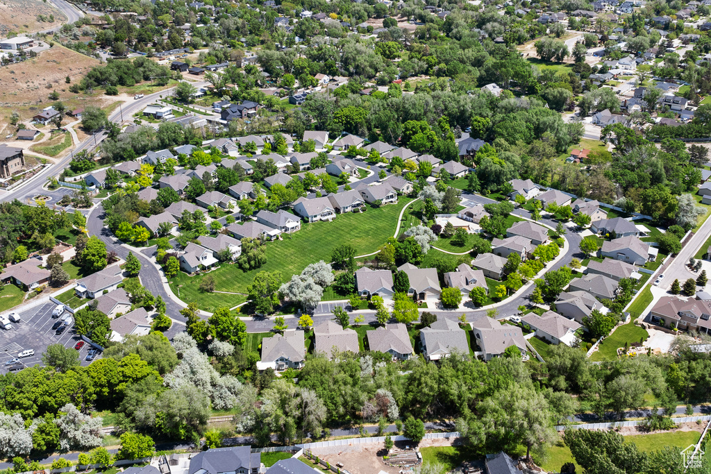 Aerial overview of property's location featuring nearby suburban area