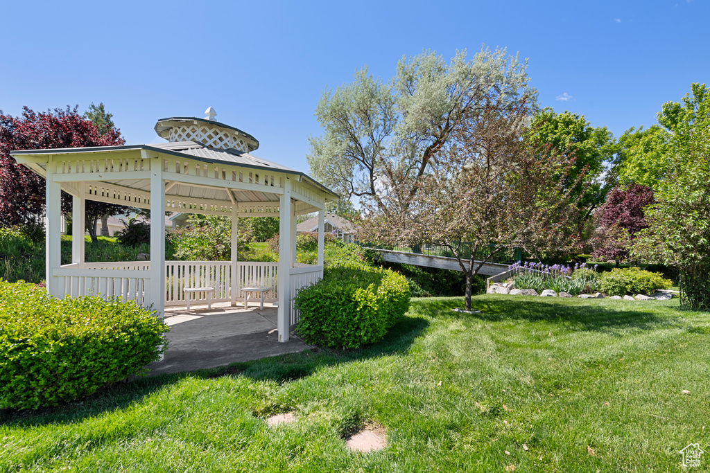 View of grassy yard with a gazebo