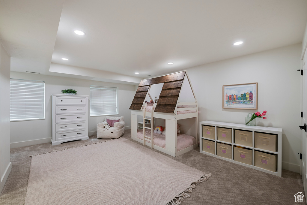 Carpeted bedroom featuring baseboards and recessed lighting