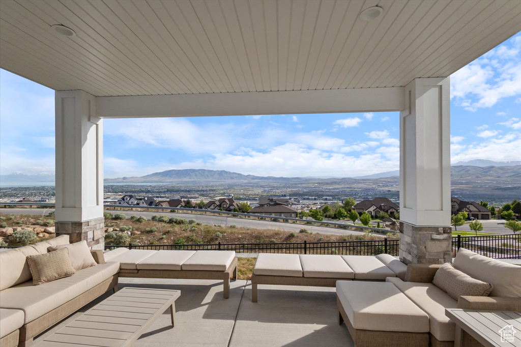 View of patio featuring outdoor lounge area and a mountain view
