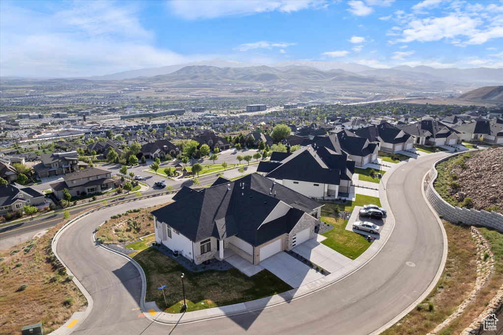 Aerial view of residential area with a mountain backdrop