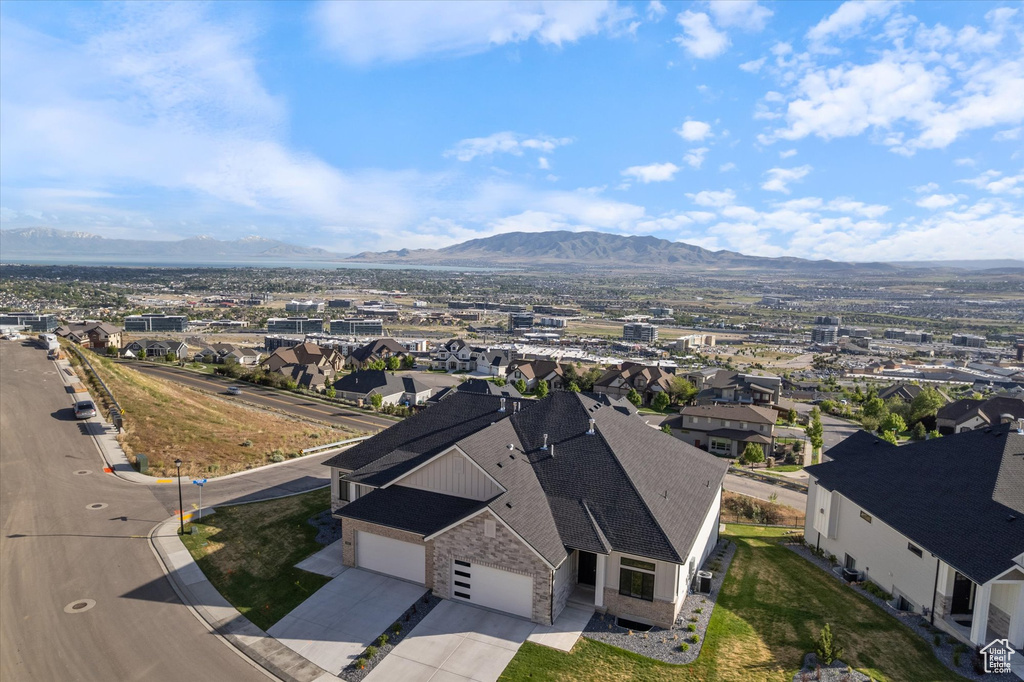 Aerial view of residential area with mountains