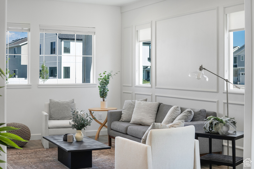Living room featuring baseboards and wood finished floors