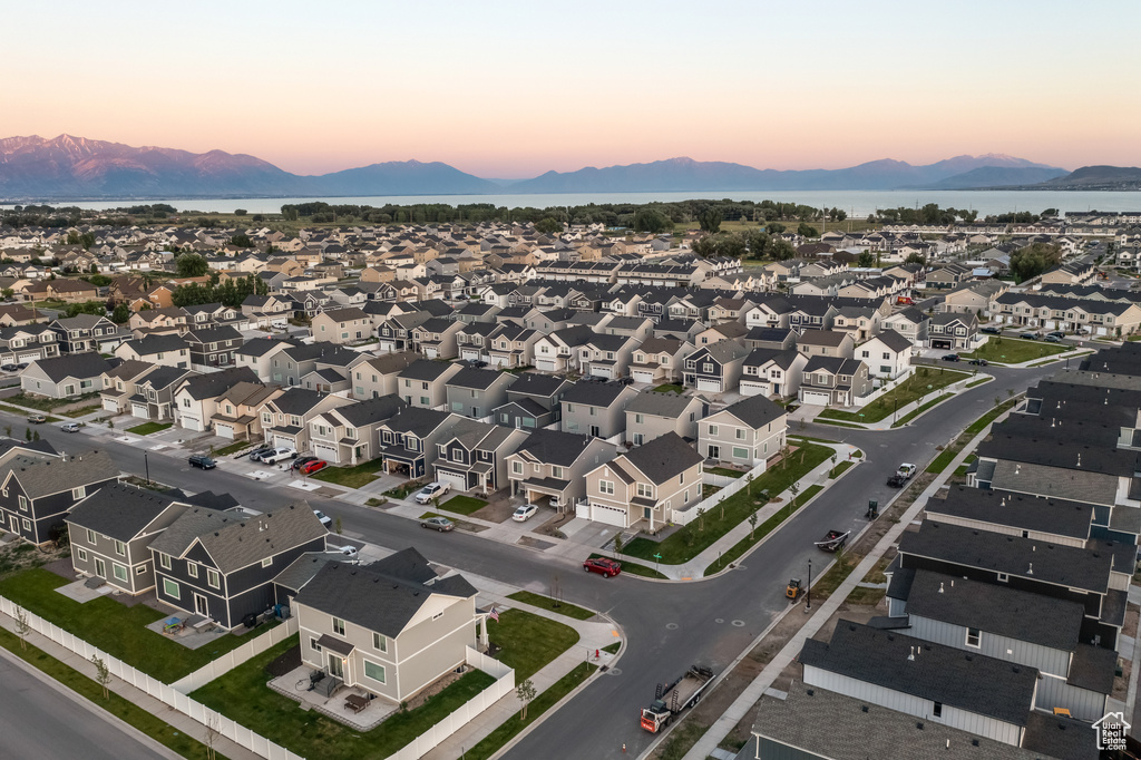 Aerial view at dusk with a mountain view and a residential view
