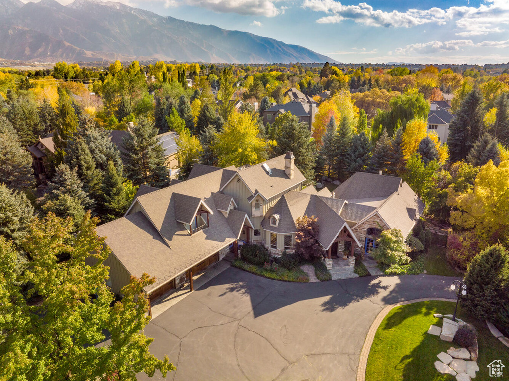 Birds eye view of property with a residential view and a mountain view