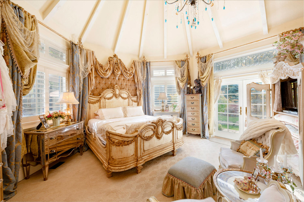 Bedroom featuring access to outside, french doors, light colored carpet, and lofted ceiling with beams