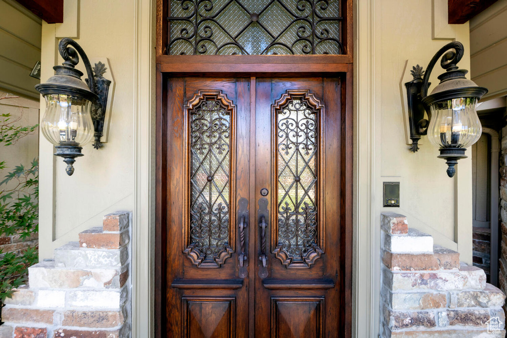 Doorway to property featuring french doors
