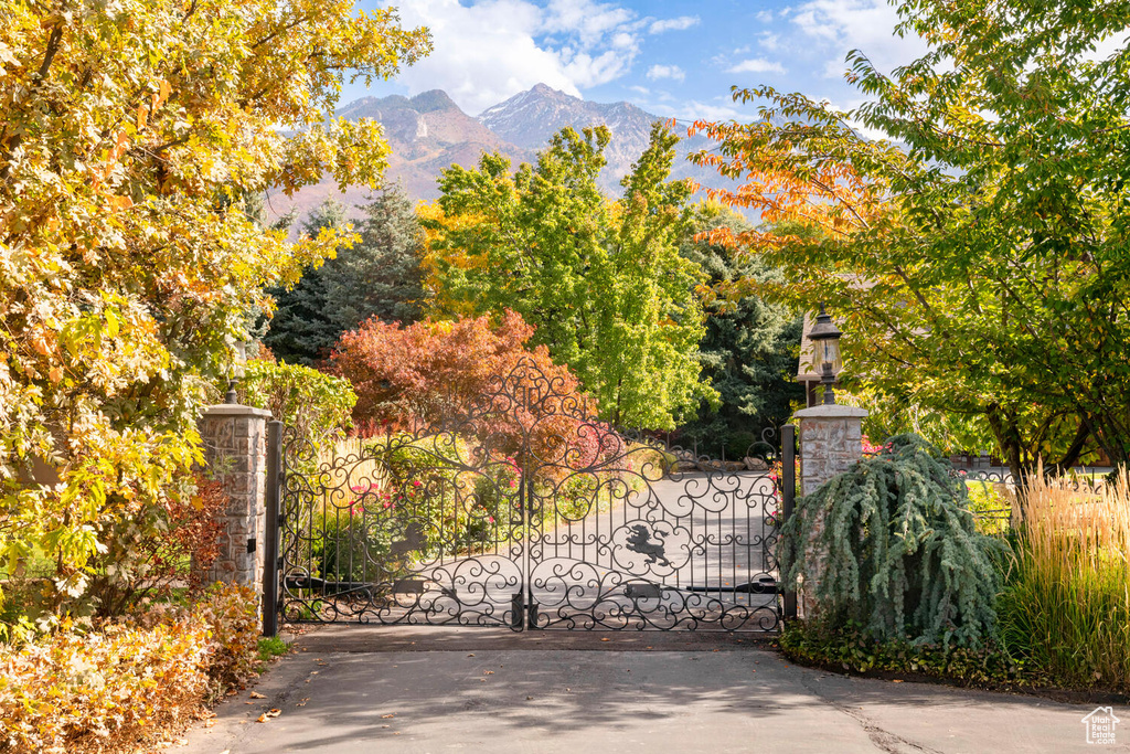 View of gate featuring a mountain view