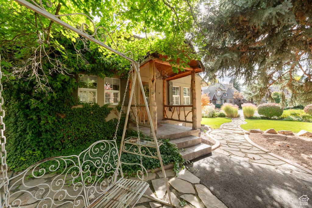 Exterior space featuring a yard