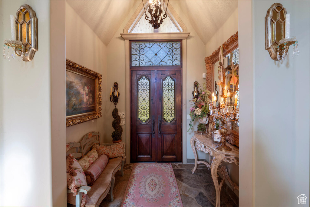 Foyer with lofted ceiling