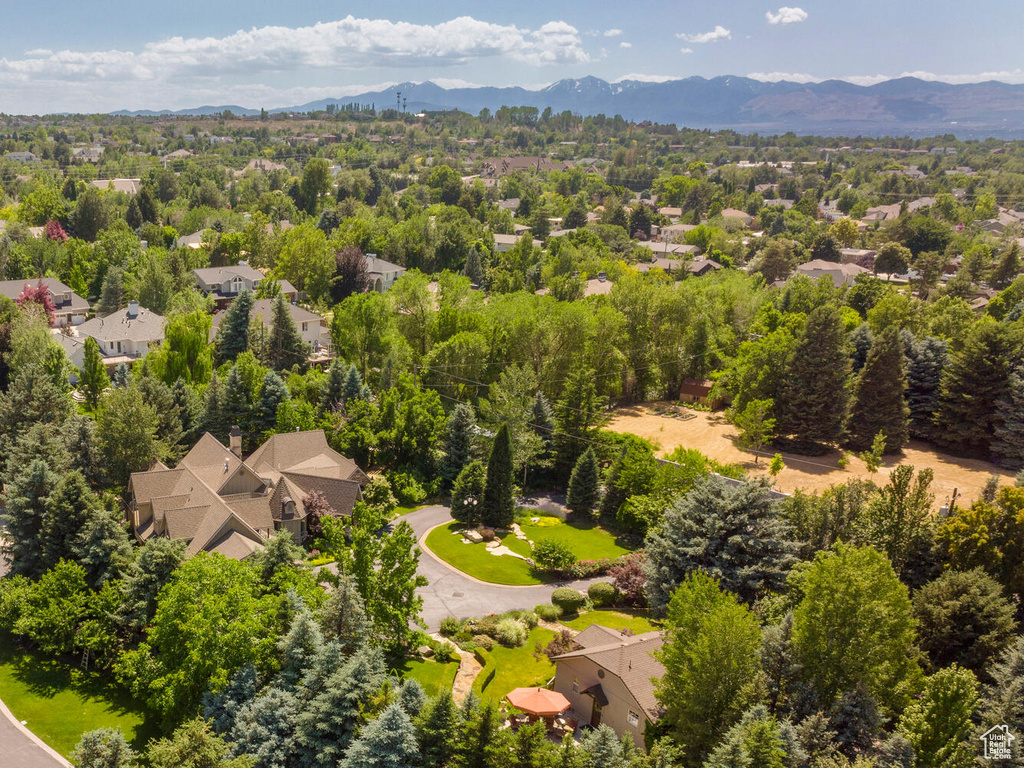 Drone / aerial view with a residential view and a mountain view