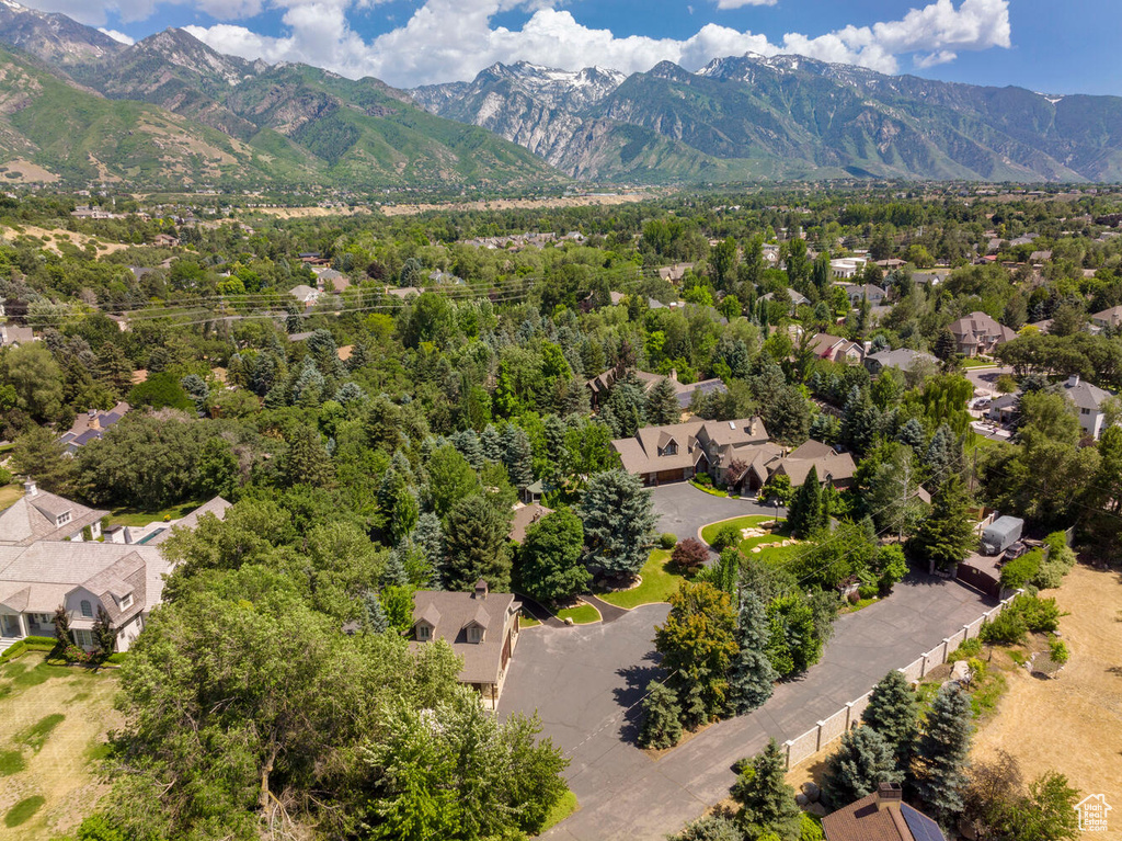 Birds eye view of property featuring a residential view and a mountain view