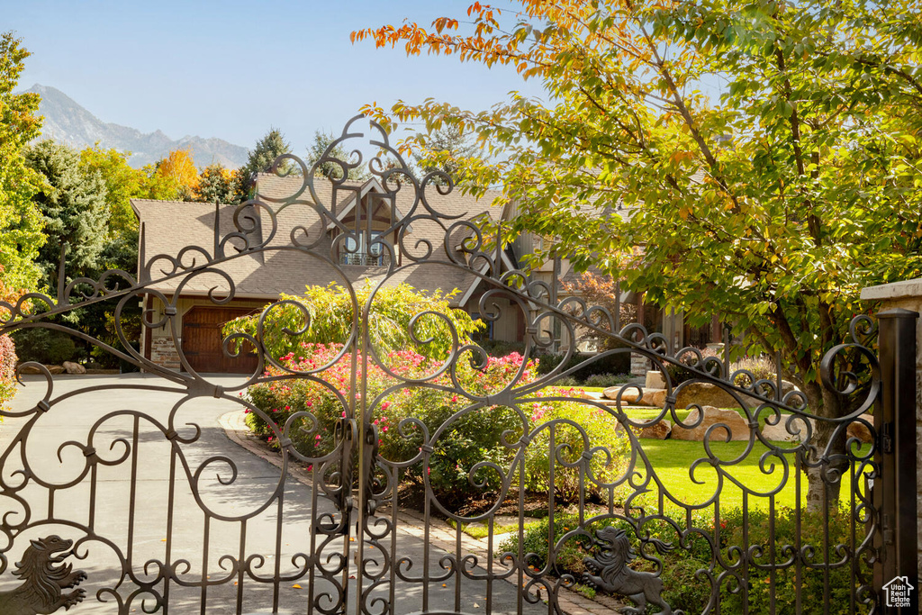 View of gate with a mountain view