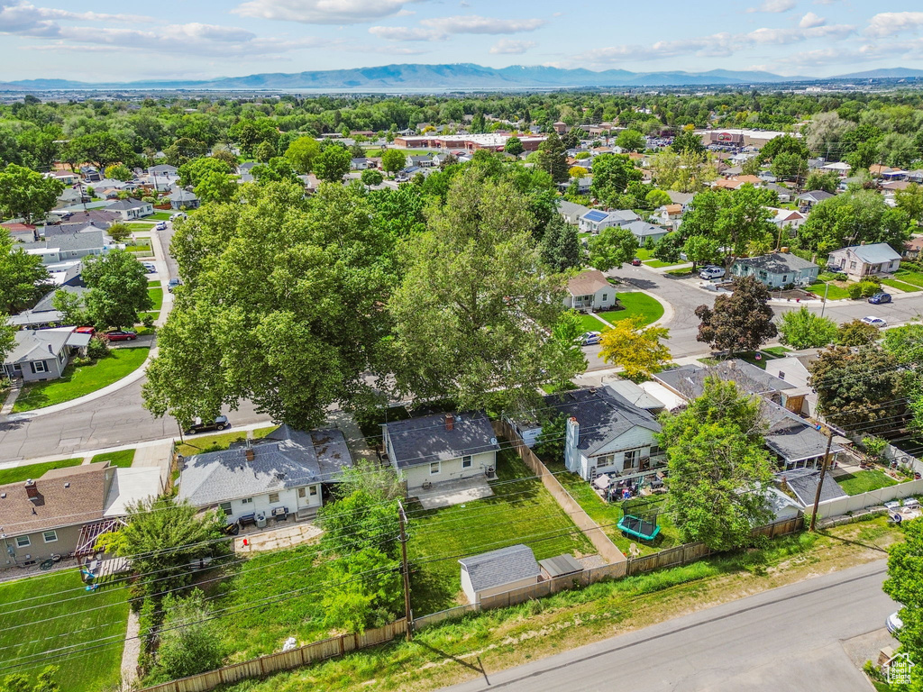 Aerial view of residential area with a mountainous background