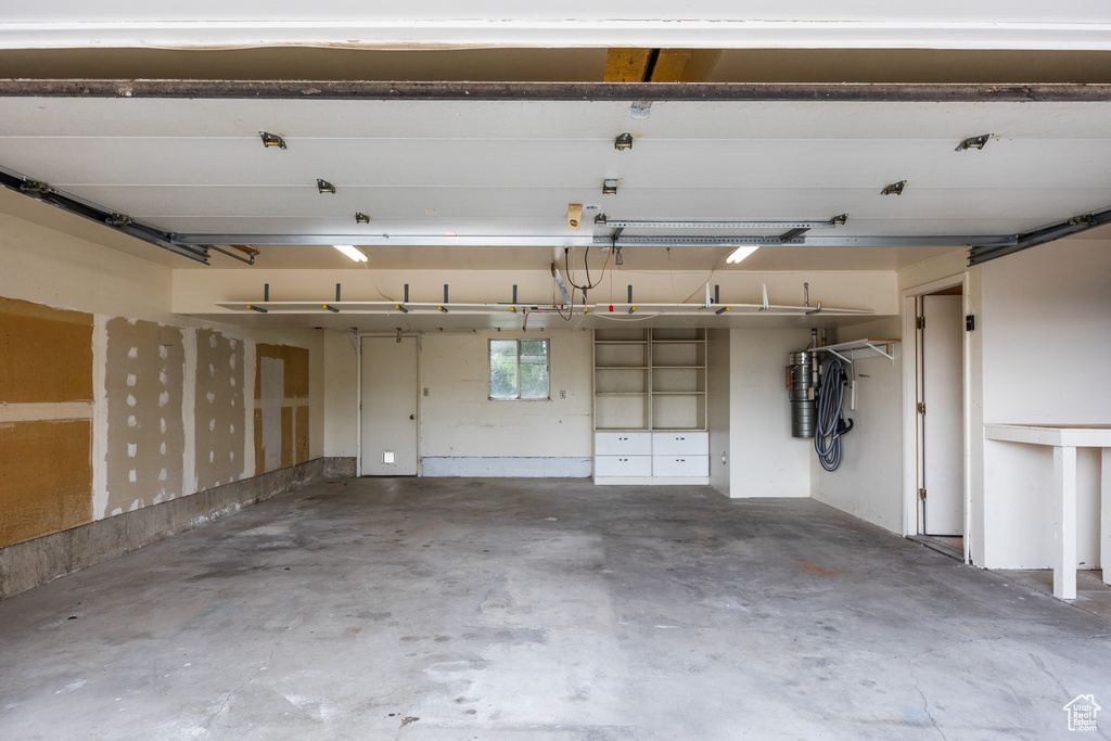 Garage with a central vacuum unit