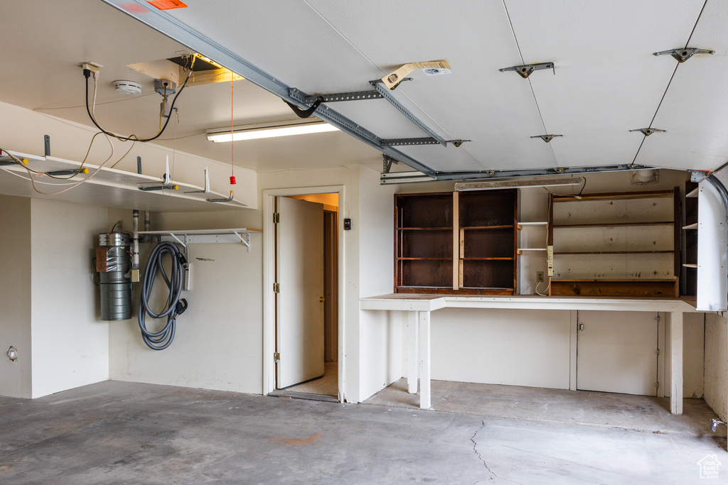Garage with a central vacuum unit
