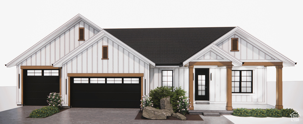 View of front of property with board and batten siding, concrete driveway, an attached garage, and roof with shingles