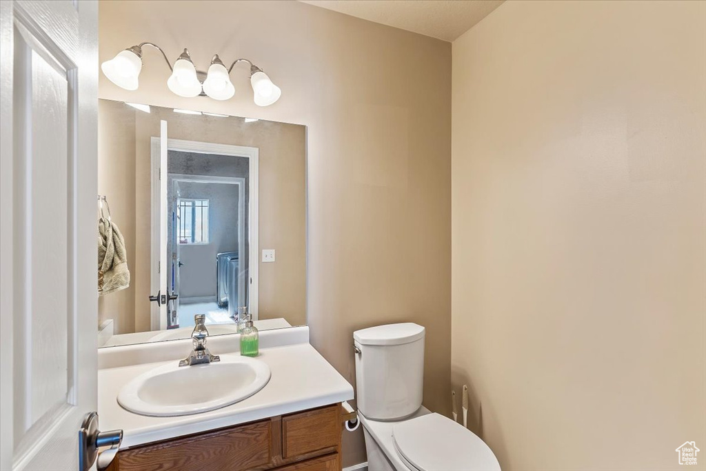 Bathroom with vanity and toilet