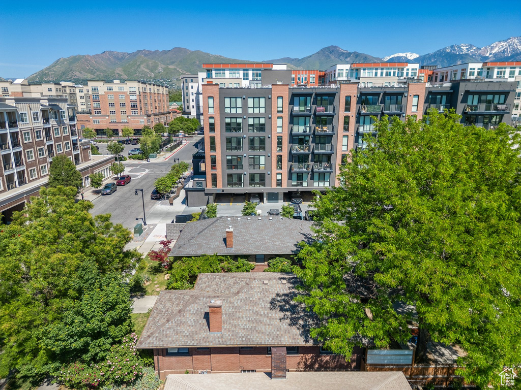View of apartment building / complex featuring a mountain view