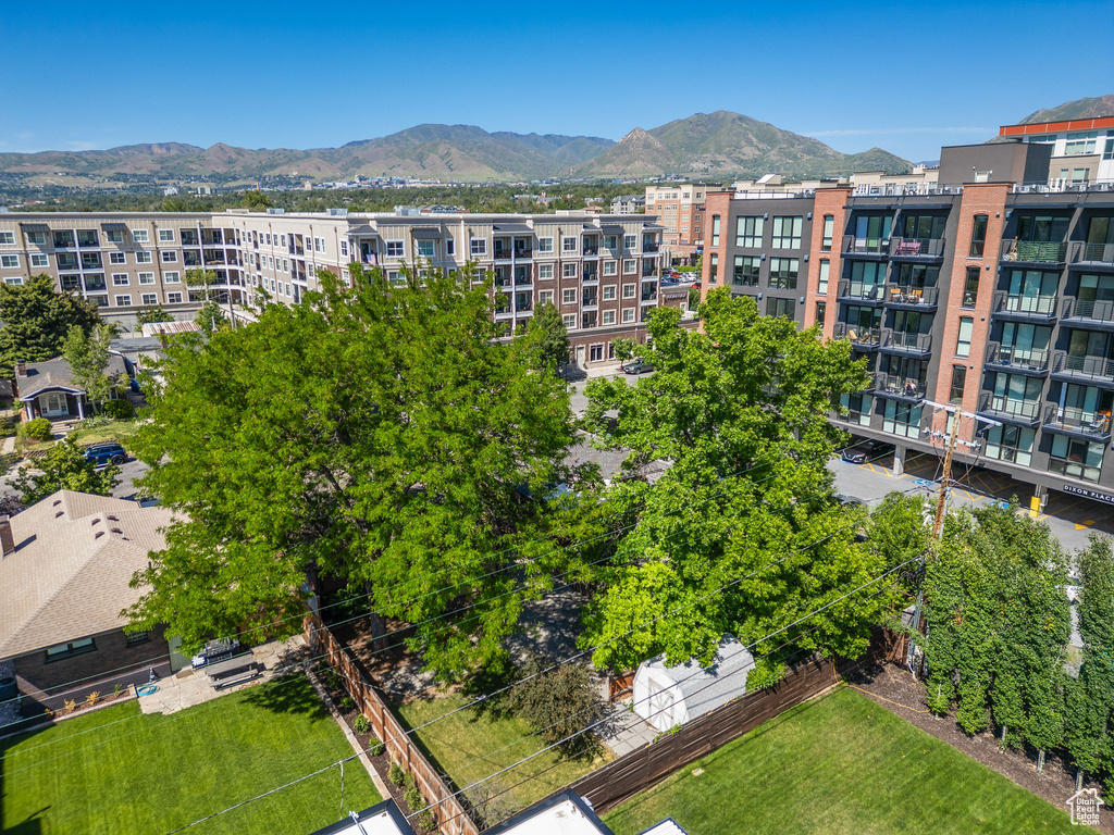 View of apartment building / complex featuring a mountain view