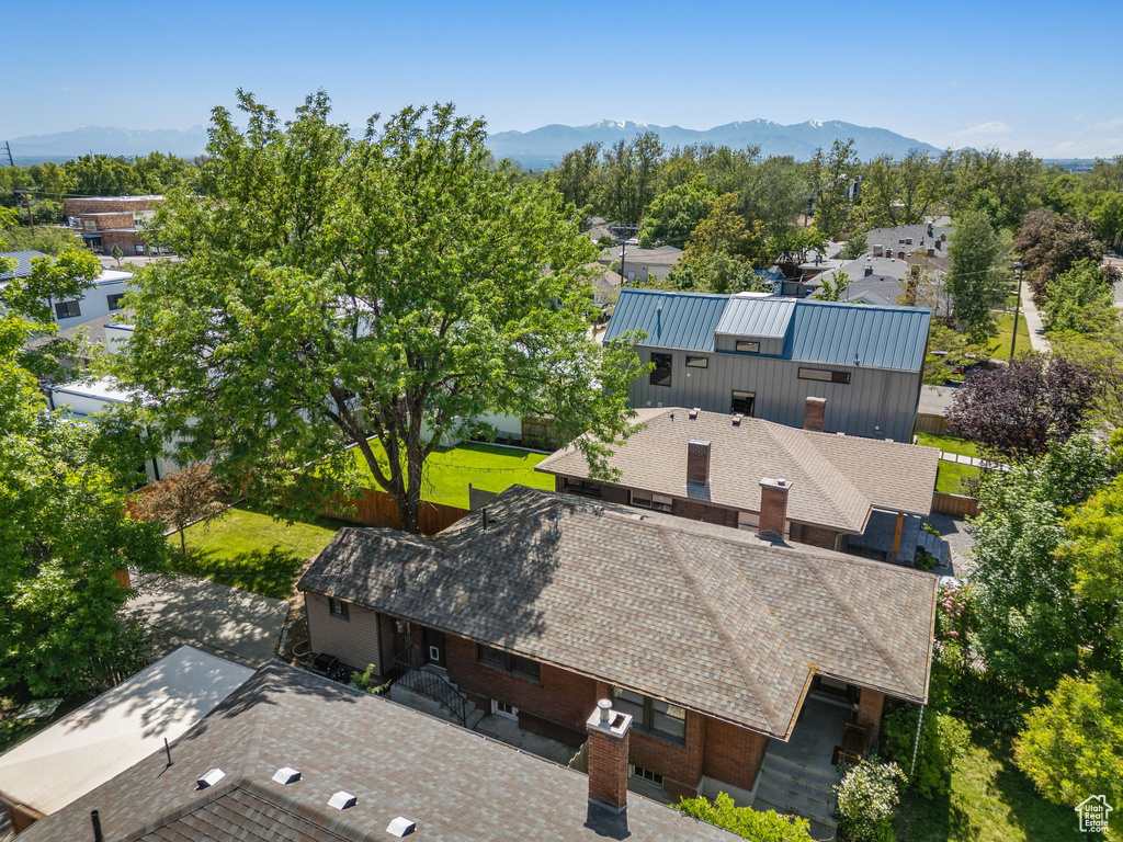 Aerial perspective of suburban area with mountains