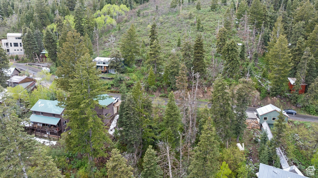 Aerial view of property\\\'s location featuring a heavily wooded area