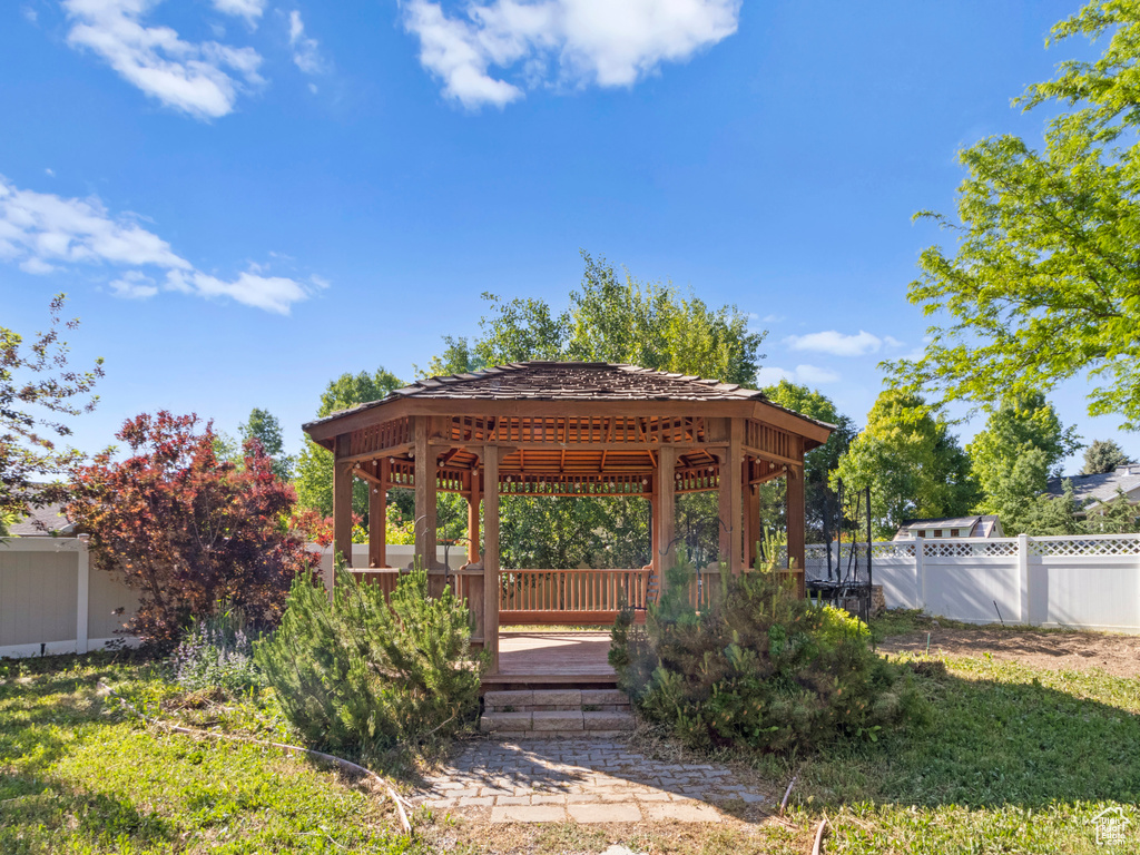 View of yard featuring a gazebo and a deck