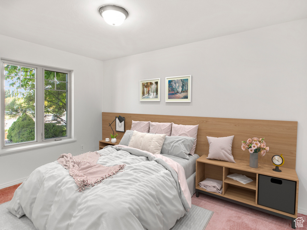 Bedroom with light carpet