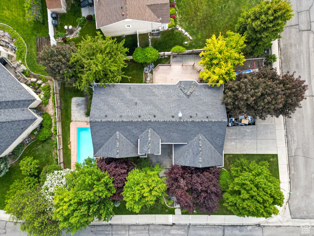 View of subject property featuring a pool area