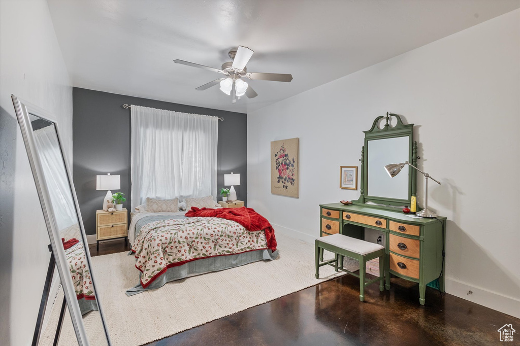 Bedroom with baseboards and a ceiling fan