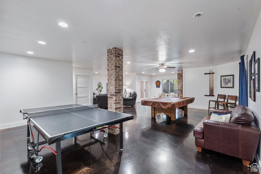 Recreation room with recessed lighting, decorative columns, concrete flooring, billiards, and baseboards