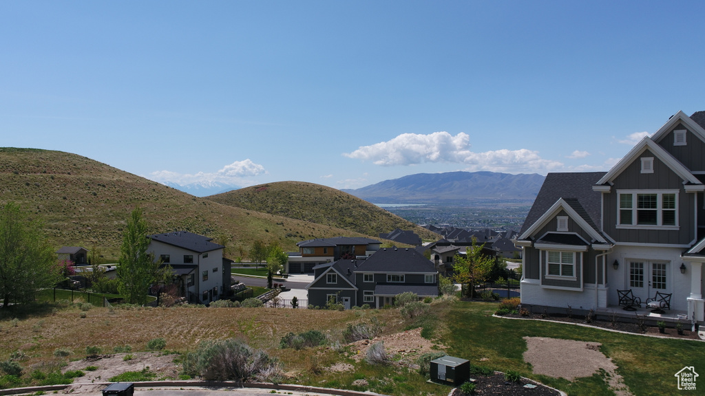 View of mountain backdrop with nearby suburban area
